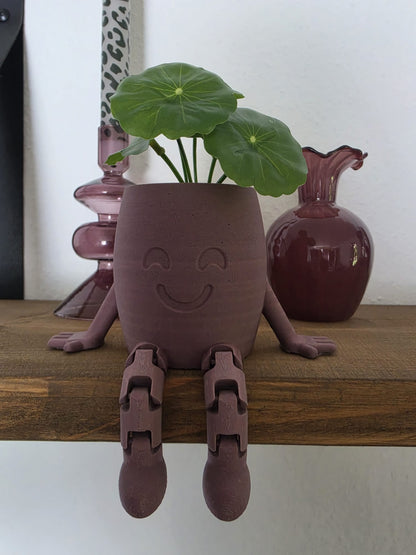 3D geprinte bloempot met beentjes – mauve met glazen vaas op achtergrond